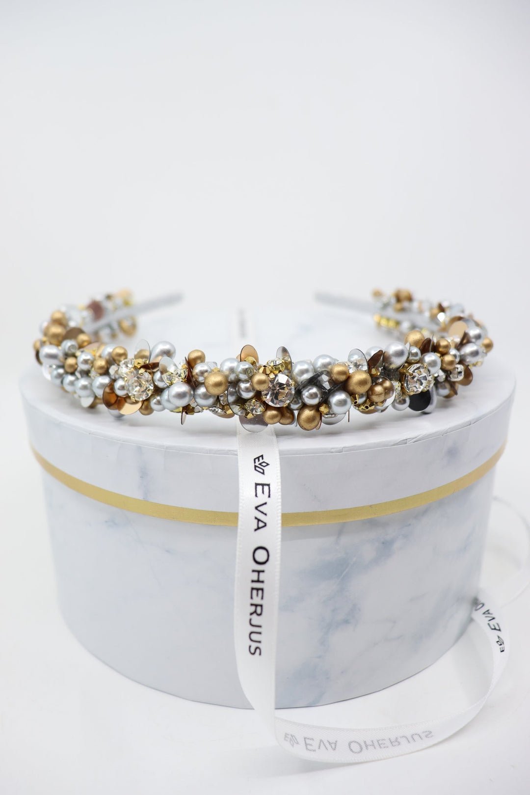3. Studio side view of Eva Oherjus Lena headband adorned with crystals, pearls, and beads