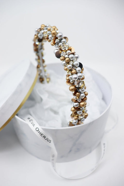 2. Close-up of Eva Oherjus Lena headband with Swarovski crystals, Preciosa pearls, and beads in luxury hat box