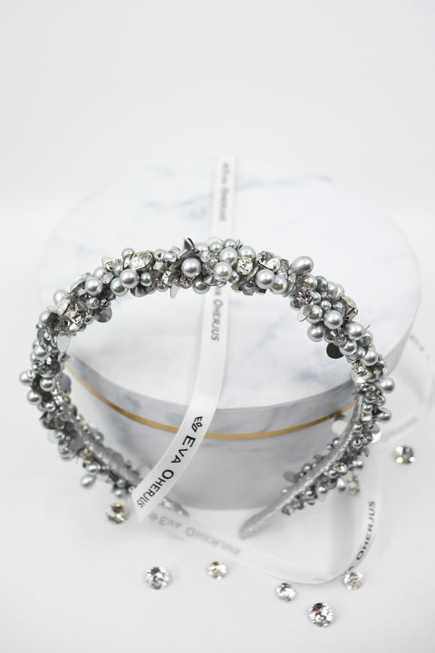 5. Top view of Eva Oherjus Selena headband with Swarovski crystals and pearls on hat box