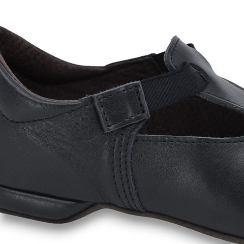 5. Close-up of OmaKing Kergatsi black dance shoe highlighting leather texture and elastic strap