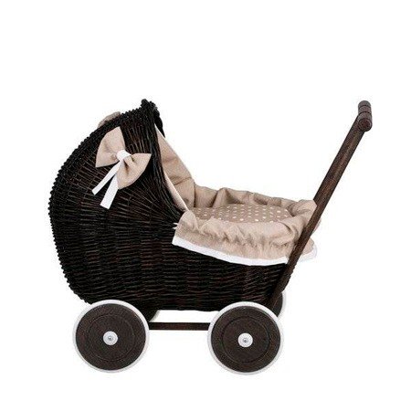 7. Side view of dark painted wicker doll pram with beige bedding, studio setting