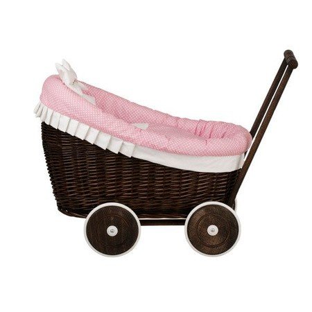 3. Profile view of dark painted wicker doll pram with pink bedding, highlighting wicker texture