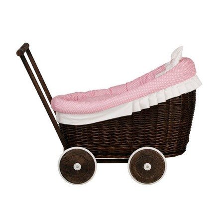 9. Side view of dark painted wicker doll pram with pink bedding, showing white wheels