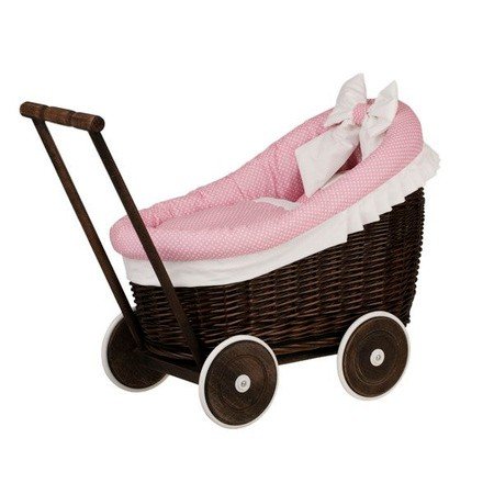 1. Dark painted wicker doll pram with pink bedding and wooden frame, shown in a studio setting