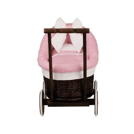 10. Front view of dark painted wicker doll pram with pink bedding and bow detail