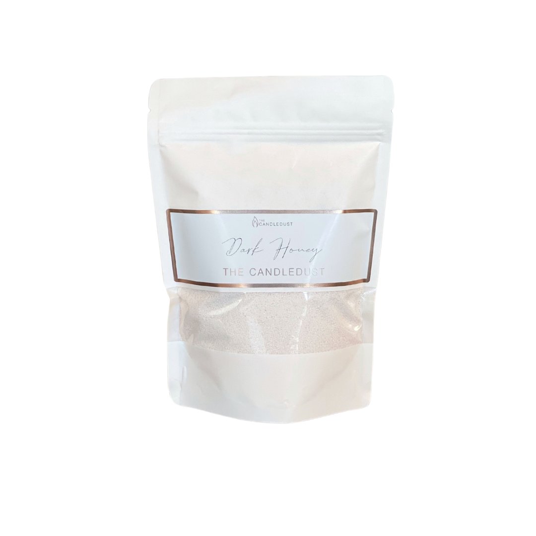 5. Studio image of Candledust Dark Honey powdered candle refill kit in a resealable bag