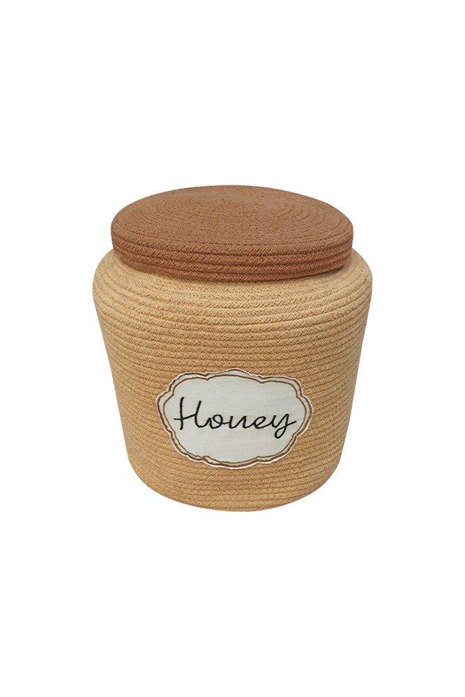 2. Studio shot of honey yellow decorative basket with toffee brown lid and embroidered 'Honey' label on white background