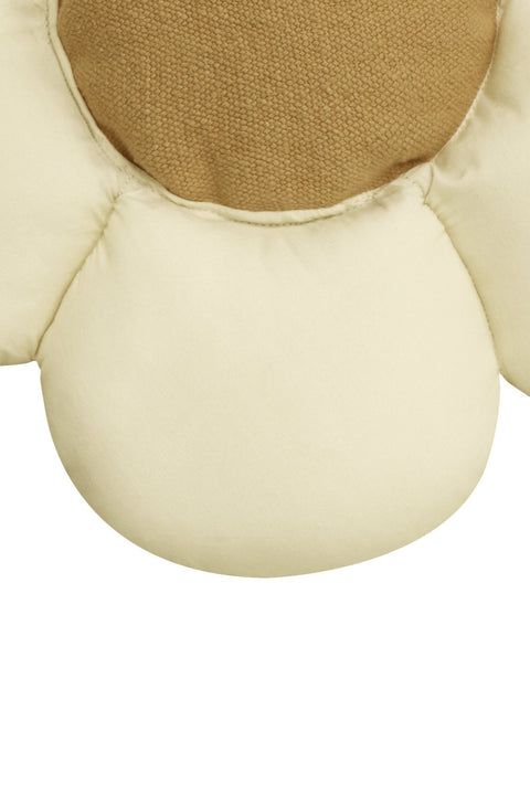 5. Close-up of decorative daisy pillow showing natural-colored petal and honey center texture