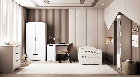 1. Spacious child's room with white Kocot Kids desk, wardrobe, and crib