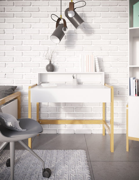 4. Children's desk with white tabletop and oak legs in a modern room with brick wall and decor