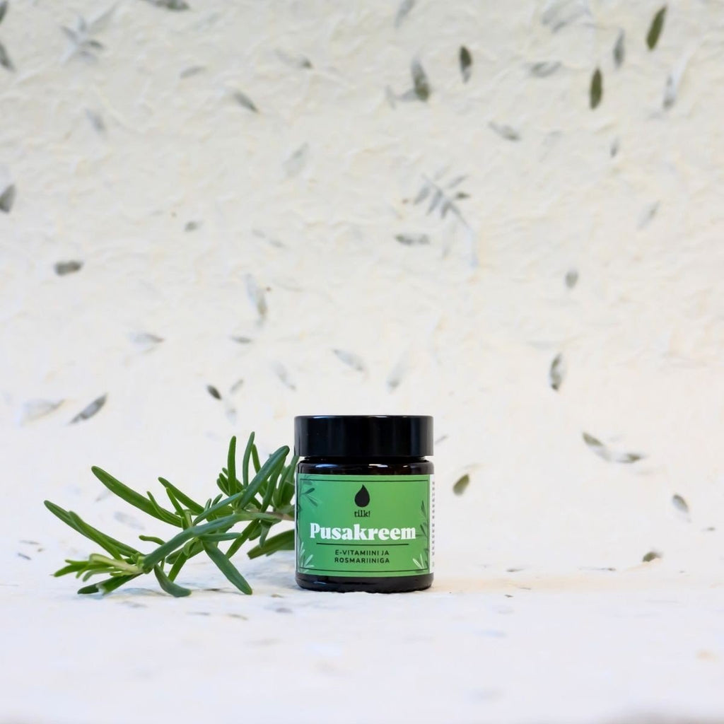 1. Tilk! Detangling Cream with Vitamin E and Rosemary, 30ml, shown with rosemary sprig in lifestyle setting