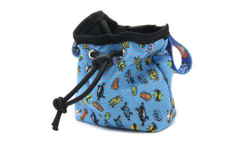 2. Front view of blue graffiti print dog treat bag with black drawstring and colorful strap, studio background
