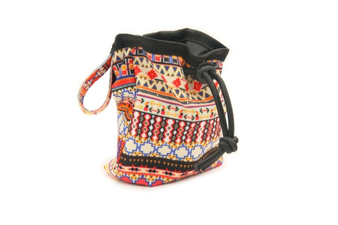 2. Side view of boho dog treat bag with vibrant pattern, showing drawstring and strap details, crafted from sturdy oxford and polyester materials.