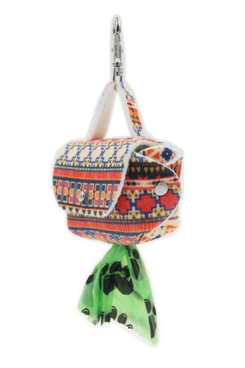 4. Boho dog waste bag dispenser with geometric print, green bag emerging from metal eyelet, hanging from snap hook
