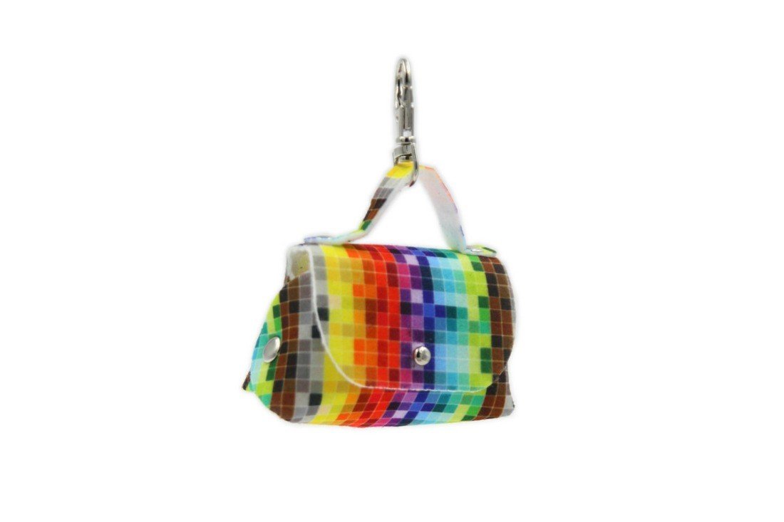 7. Side view of dog waste bag dispenser with vibrant pixel design and metal snap hook, shown in a studio setting.