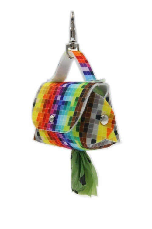 2. Hanging dog waste bag dispenser with vibrant pixel design and durable snap hook, displaying a green bag partially pulled out.