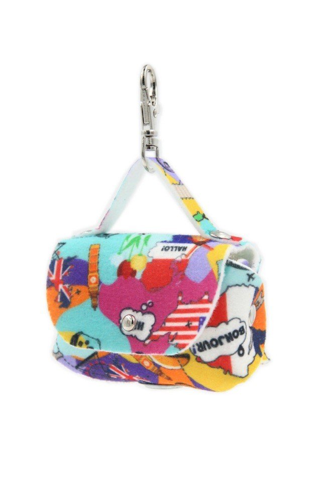 2. Matteo dog waste bag dispenser in colorful felt with cartoon motifs, featuring a durable snap hook and metal eyelet