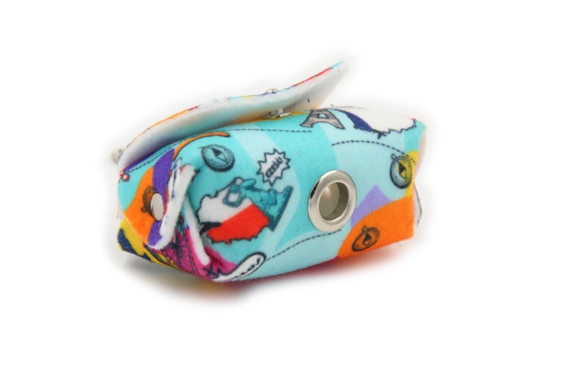 7. Close-up of Matteo dog waste bag dispenser showing metal eyelet and colorful felt material