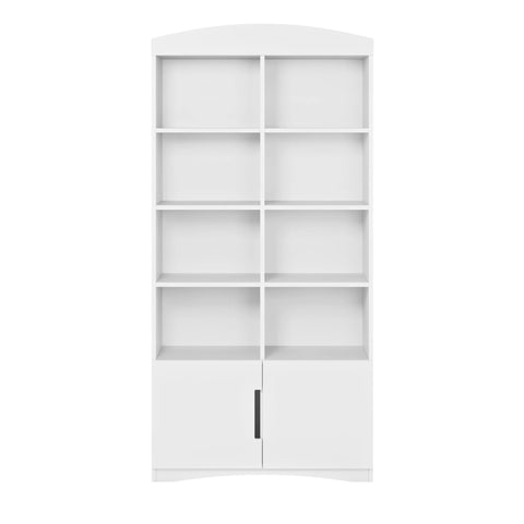 2. Front view of white Kocot Kids Julia double bookshelf with eight open shelves and one closed shelf, studio setting