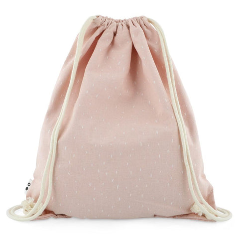 3. Back view of pink drawstring bag with white strings in studio setting