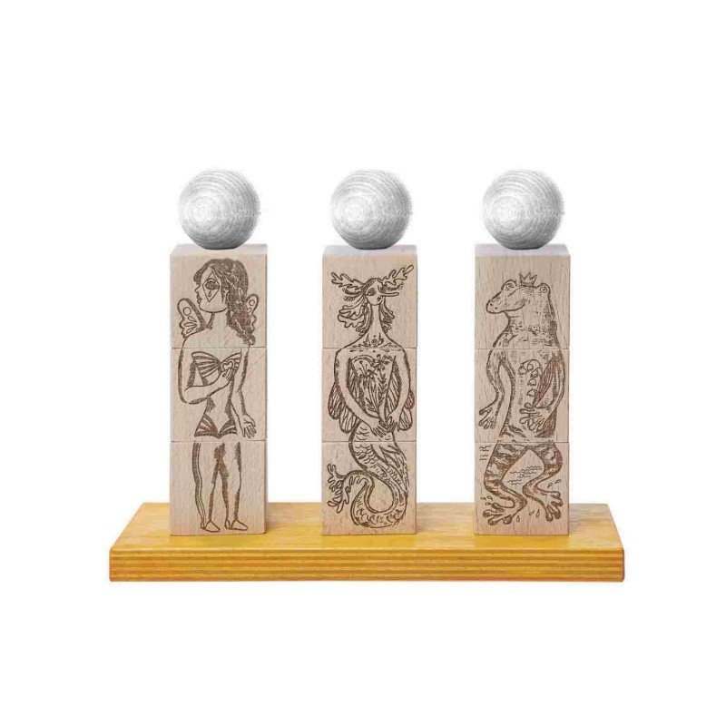 2. Wooden Story Dreamland Spinner Puzzle with engraved characters on wooden blocks, featuring Commedia dell'arte, Secret Garden, and Magic Forest themes, displayed on a wooden base