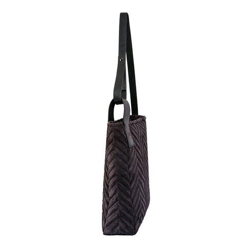 3. Side view of RR mixed material handbag highlighting genuine leather strap and soft-touch fabric