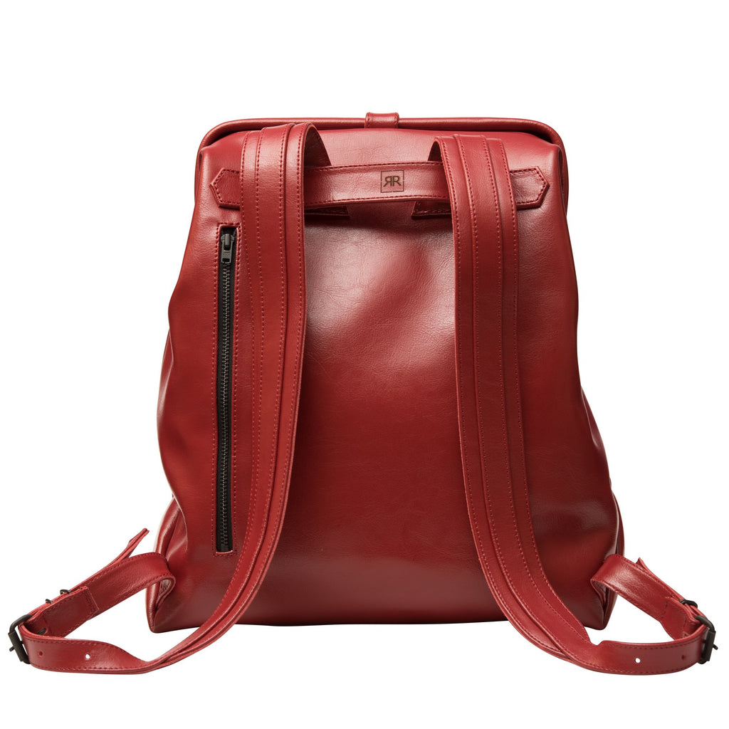 2. Back view of RR red leather backpack showing adjustable shoulder straps and zip pocket