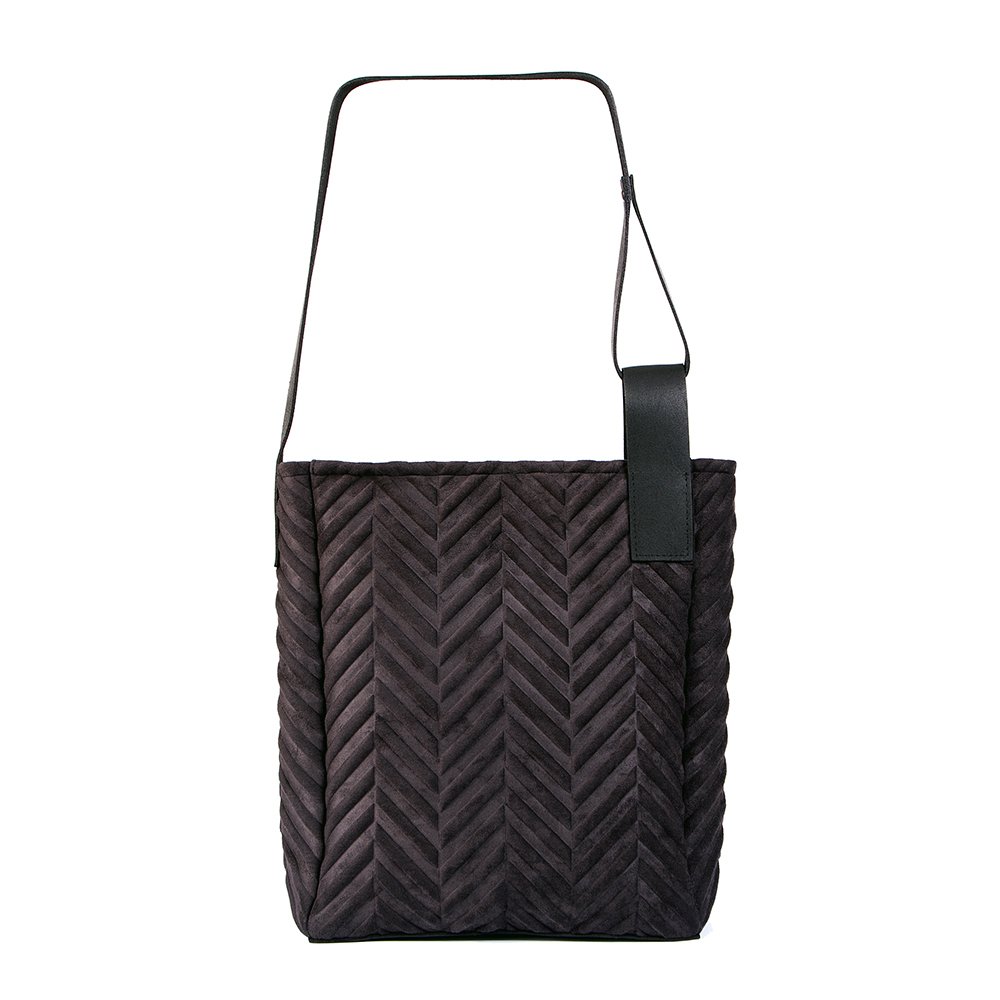 4. Studio shot of RR mixed material handbag with adjustable leather strap and chevron design