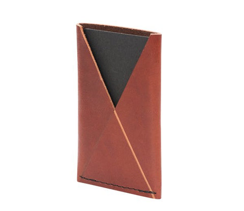 2. Studio shot of RR slim card holder in light brown leather, angled view