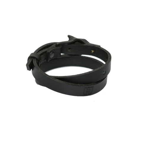 2. Rear view of black matte Wolf Leather Bracelet by RR with double wrap design, shown in studio