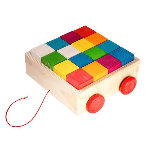 1. Set of colorful wooden blocks arranged on a wooden cart with red wheels and a pull string, showcasing ROOSI Traditional Toys' handmade design