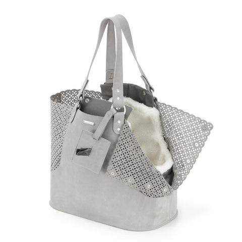 3. Close-up of light grey Nubuck Elva dog carrier bag by Labbvenn, showing interior with soft lining and perforated sides
