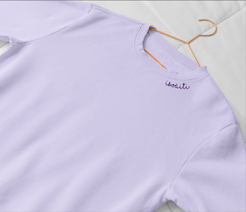 1. Unisex lilac embroidered organic cotton sweatshirt by Beebila, shown on hanger