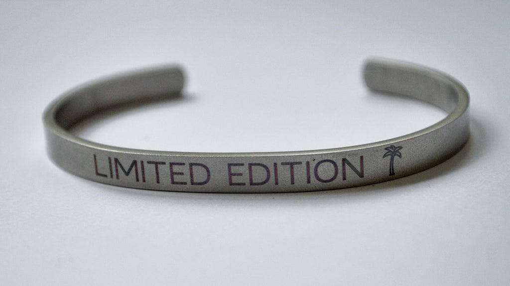 7. Silver men's bracelet with engraved text 'LIMITED EDITION' and a palm tree icon on a white background