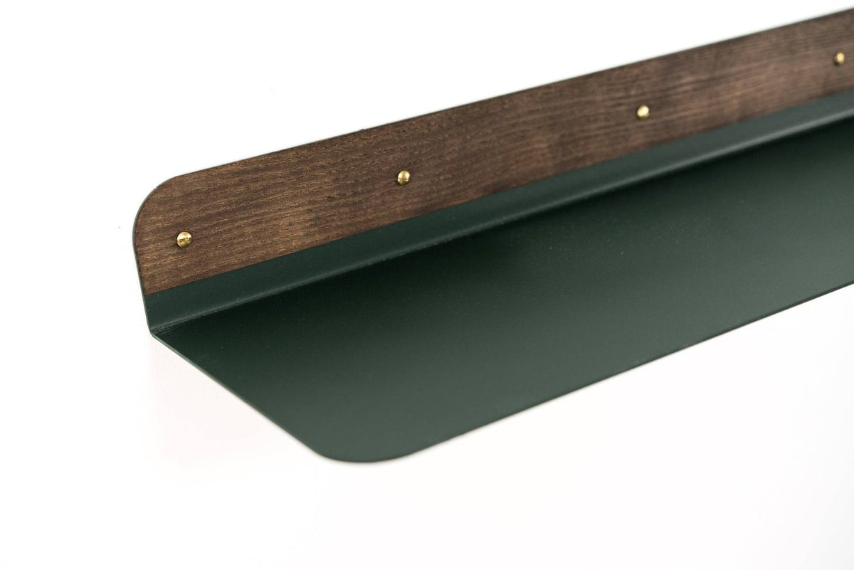 4. Green wall-mounted shelf with rounded edges and wooden back, by Ewart Woods
