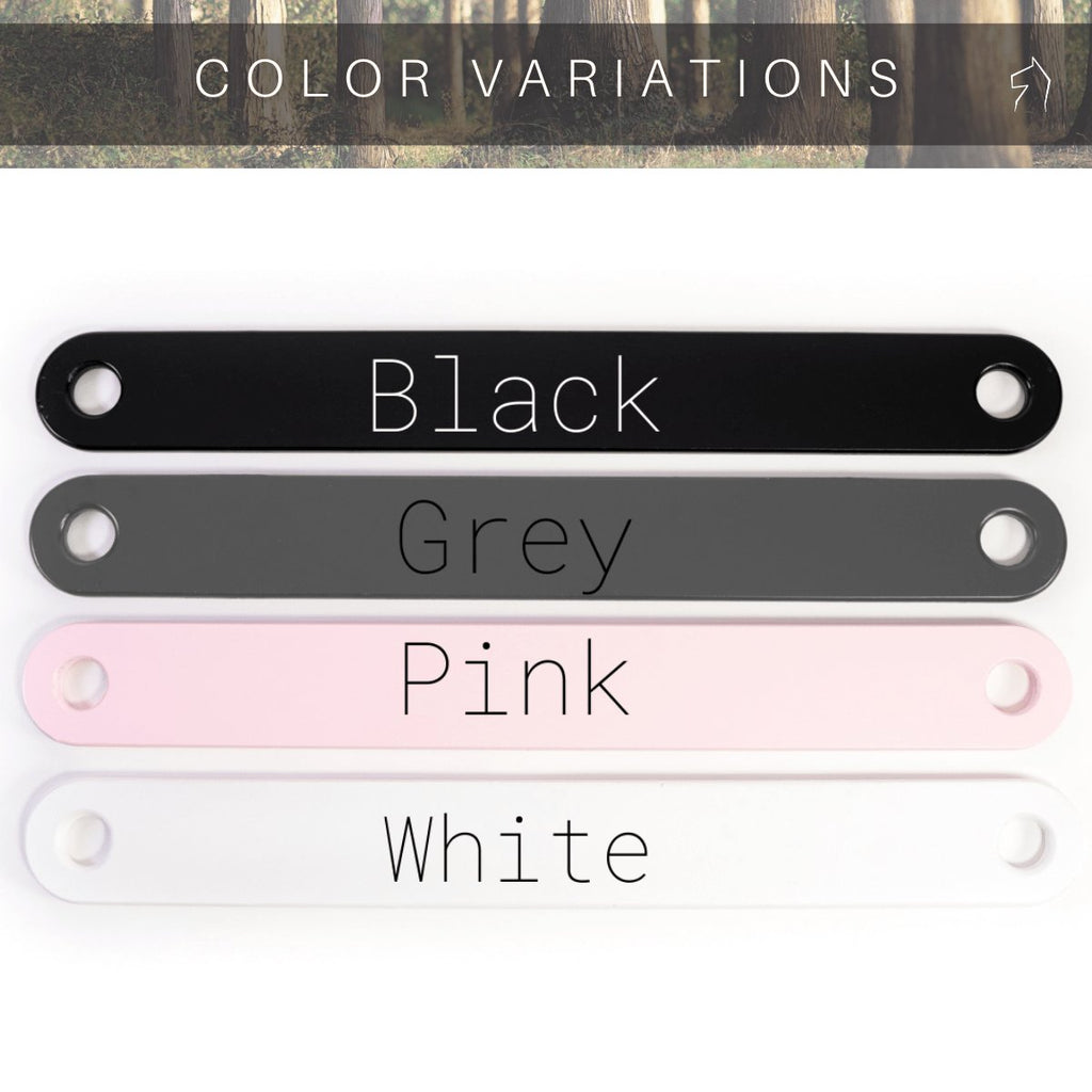 2. Color variations of Ewart Woods balance beams in black, grey, pink, and white