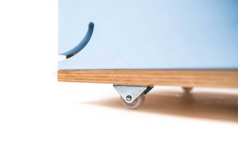 3. Close-up of wheel detail on blue whale-shaped wooden toy box