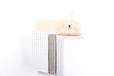 1. Beige steel and wood towel rack with a checkered towel and a diffuser on the shelf, mounted on a white wall