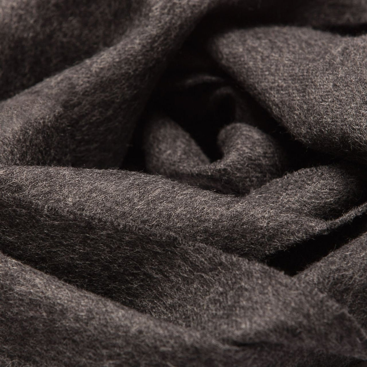 17. Close-up of dark brown Alpaka baby alpaca wool fabric texture