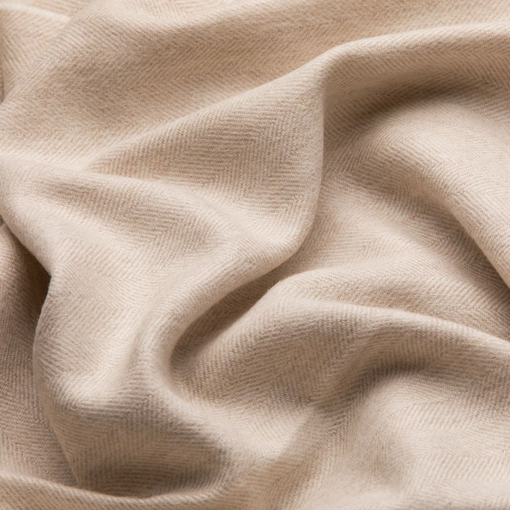 21. Close-up of Alpaka natural baby alpaca wool fabric in beige, showing texture