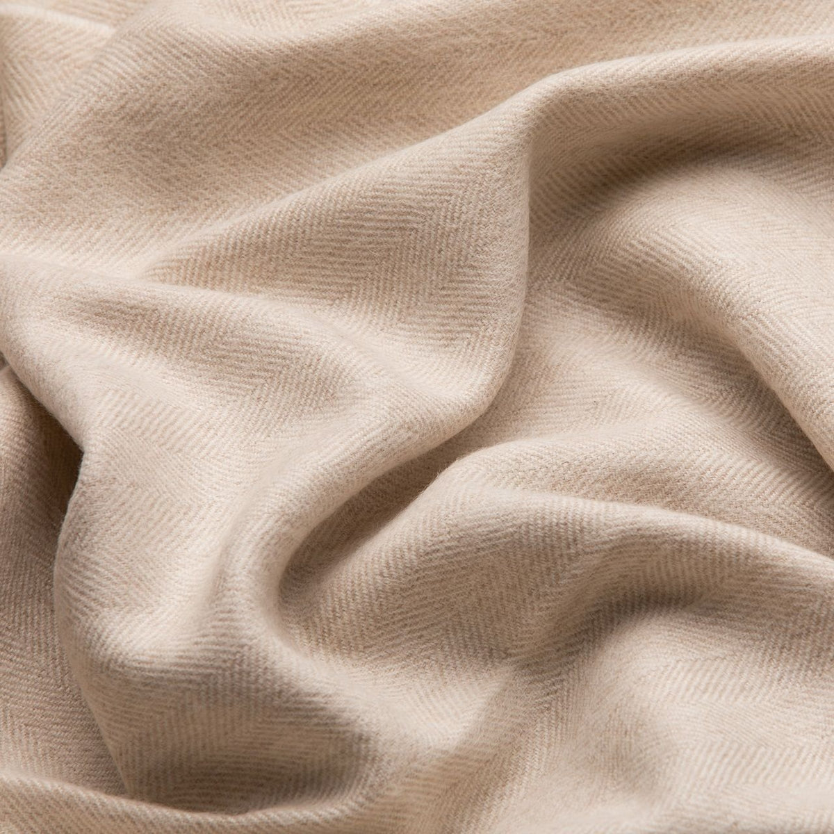 21. Close-up of Alpaka natural baby alpaca wool fabric in beige, showing texture