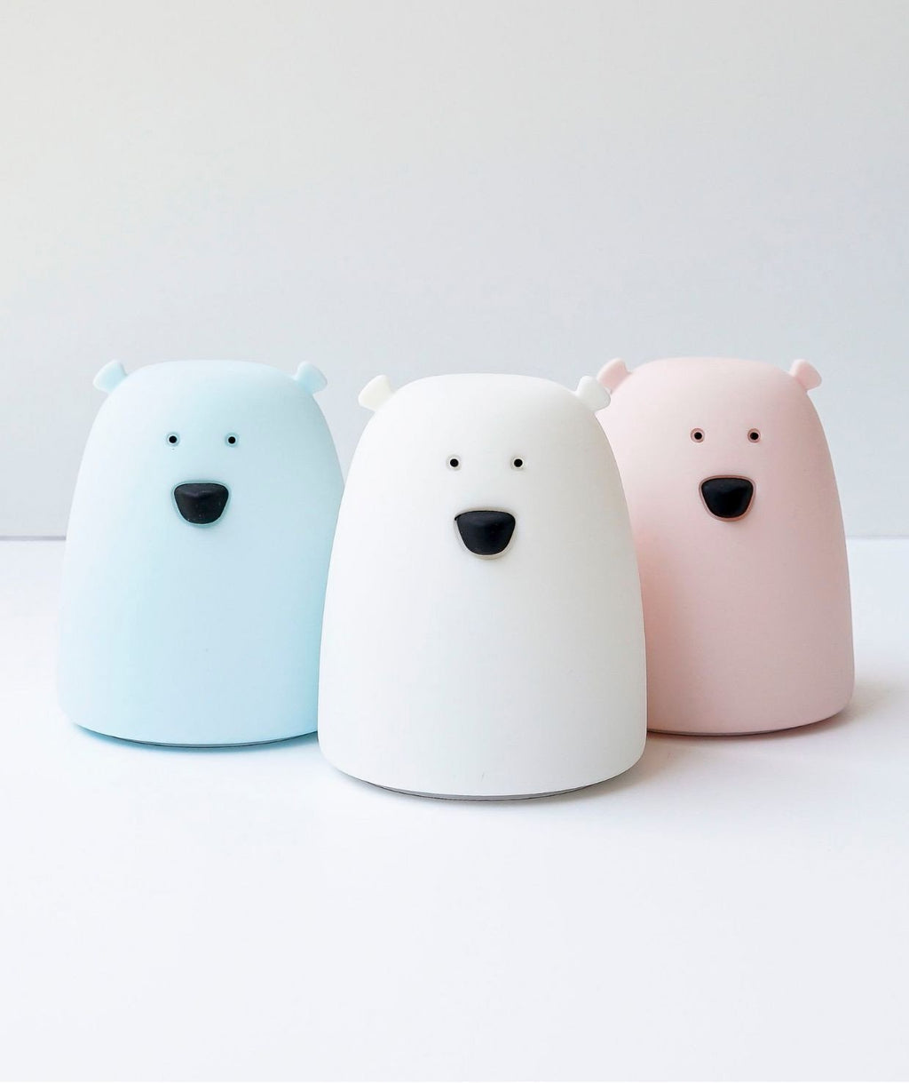 1. Three Little Bear silicone lamps in pink, white, and blue on a white surface