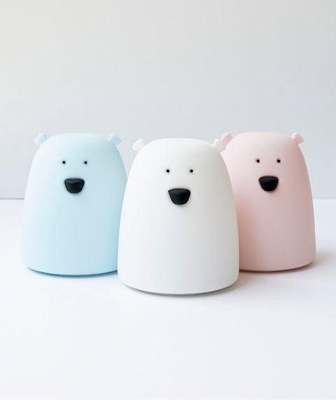 1. Three Little Bear silicone lamps in pink, white, and blue on a white surface