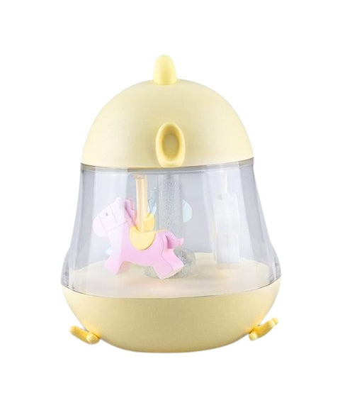 3. Close-up of yellow Rabbit & Friends lamp with carousel and music box, featuring pink horse inside clear dome