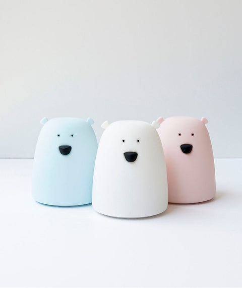 1. Three Little Bear silicone night lamps in blue, white, and pink on a white surface