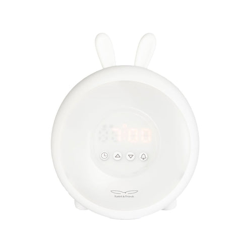 2. White Rabbit & Friends alarm clock lamp with rabbit ears on a clean background showing digital display and control buttons