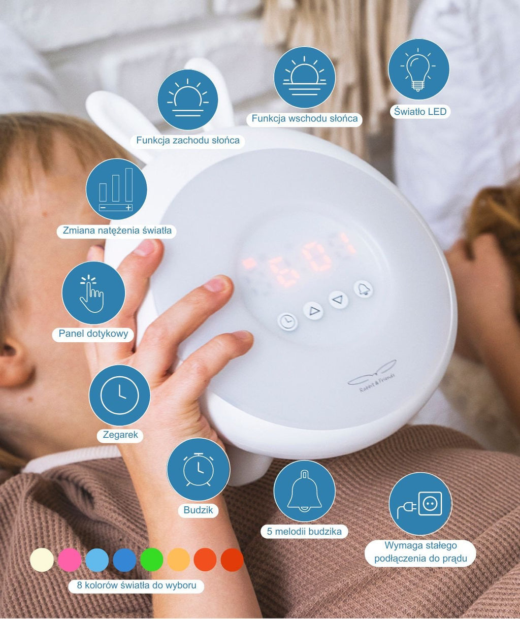3. Close-up of Rabbit & Friends alarm clock lamp held by child, highlighting features like sunrise and sunset functions, LED light, and touch panel