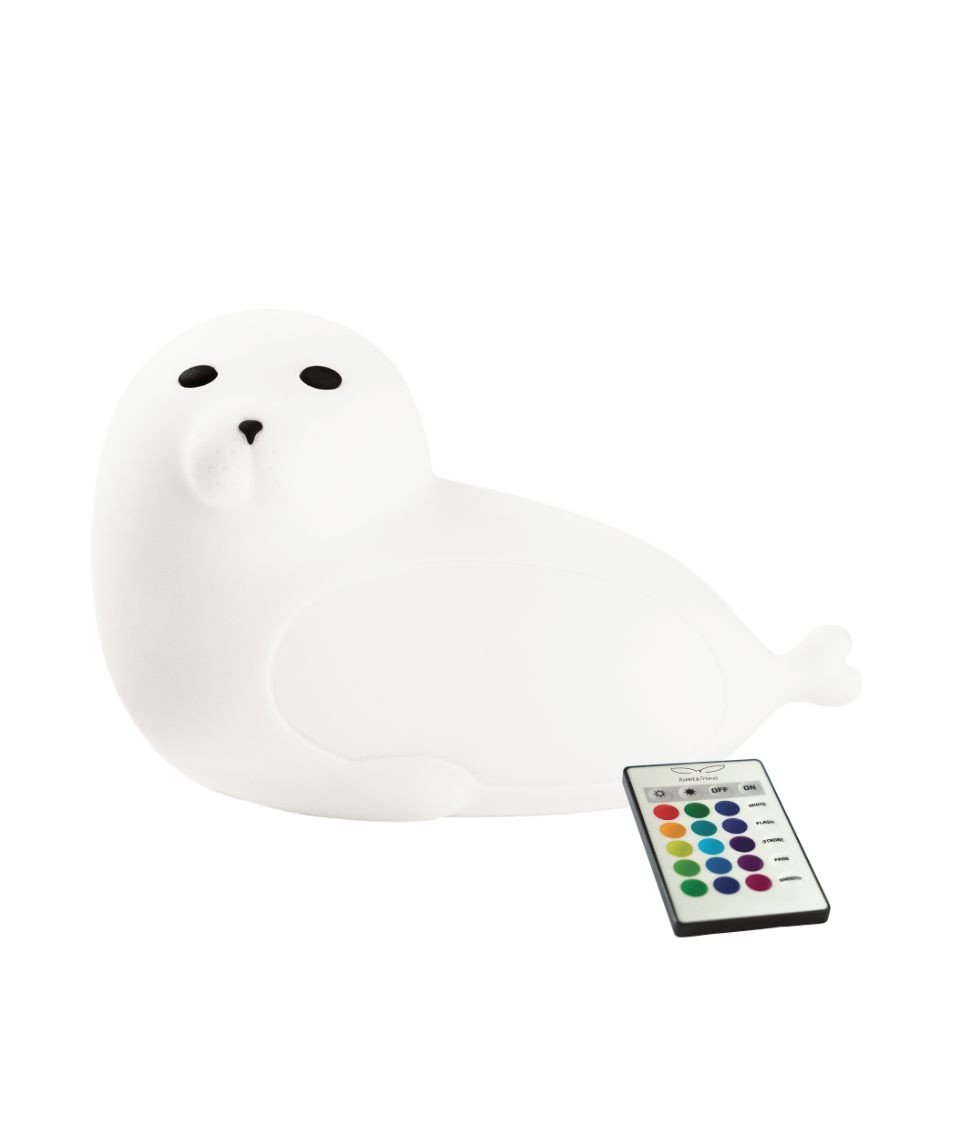 2. White seal-shaped silicone lamp with remote control on white background