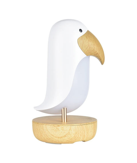 2. White bird-shaped lamp with wooden base shown in studio setting