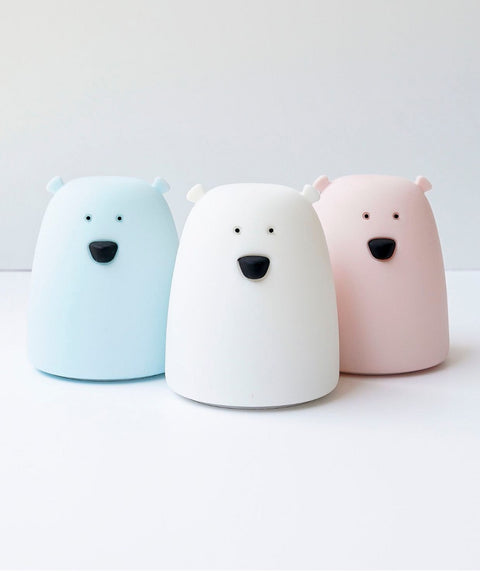 1. Three Little Bear silicone lamps in blue, white, and pink on a white surface